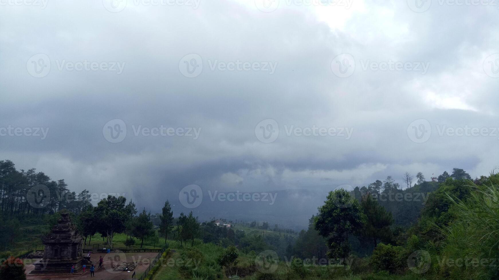 2. View of hills covered with fog photo