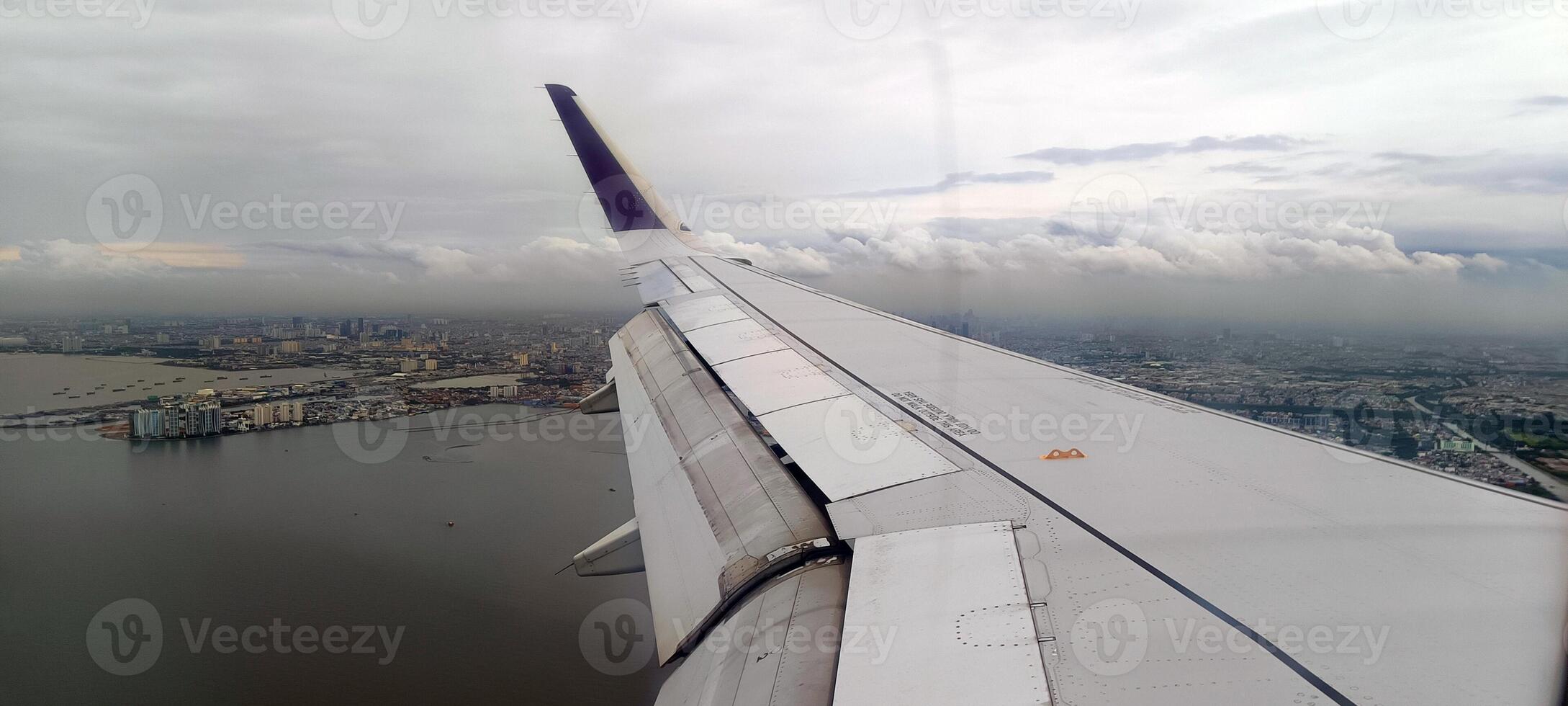 19. View of the island and sea from the airplane window photo