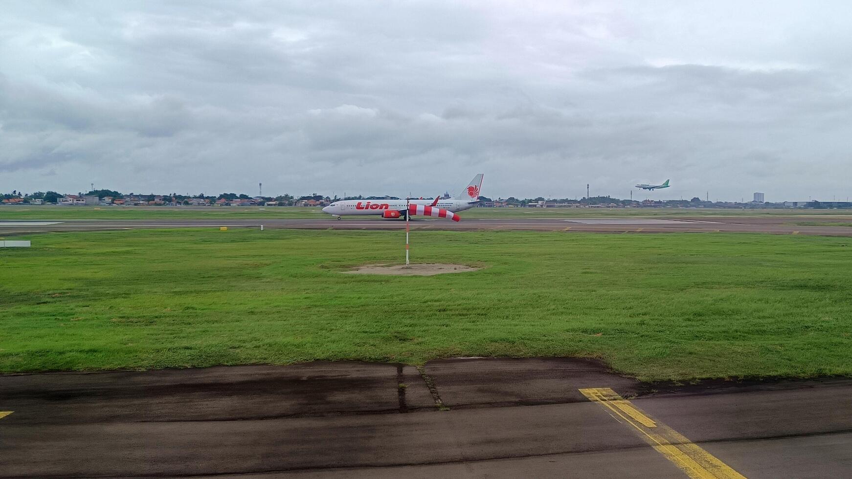 2. 22 October 2024, View of Lion Air Plane at the airport runway photo