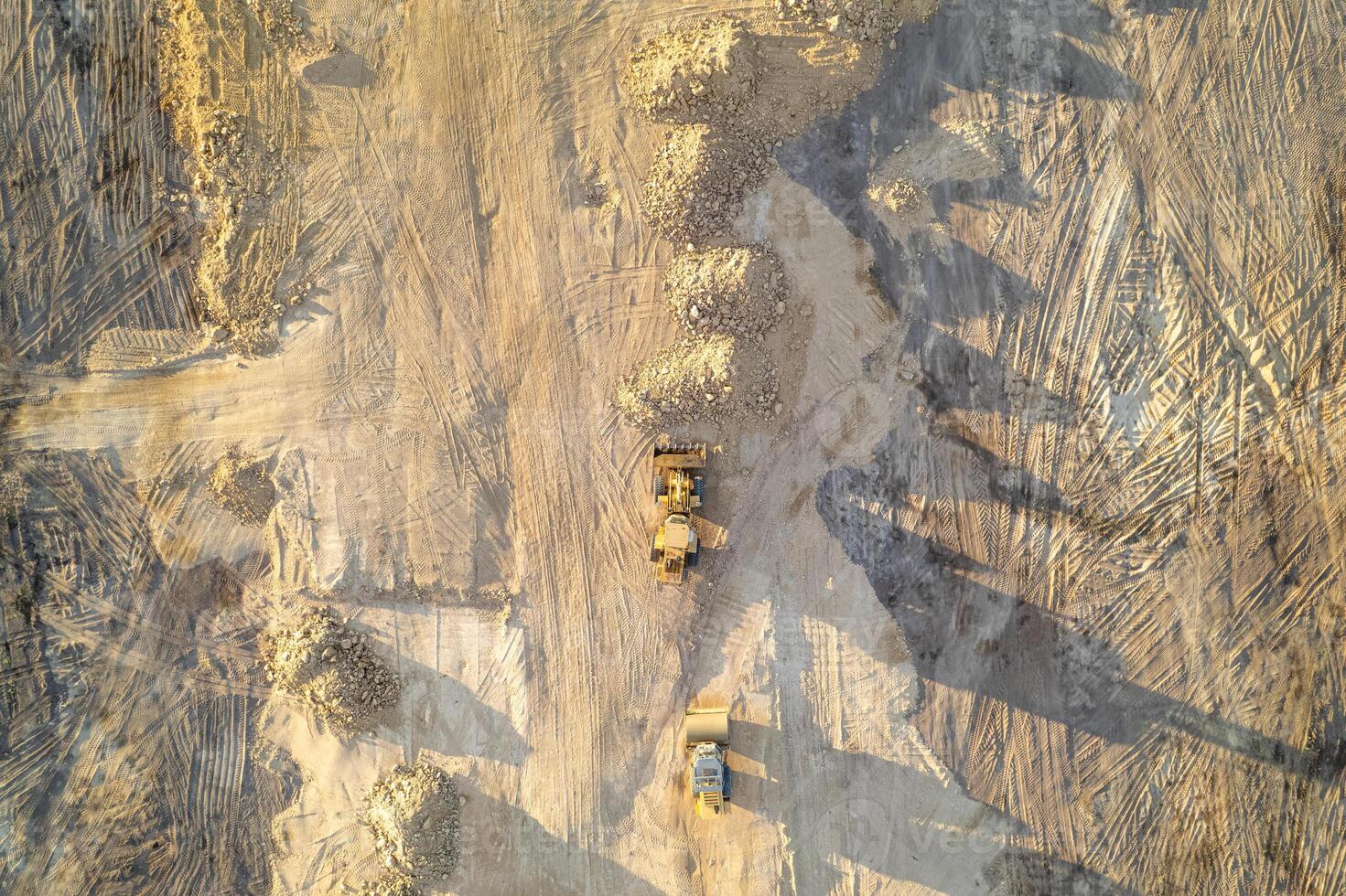 earthmoving equipment at a construction zone.Top down view by drone, aerial image photo