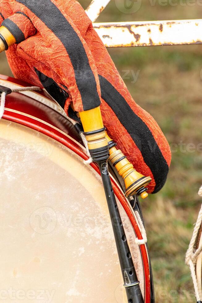 a Galician bagpipe supported by a bass drum photo