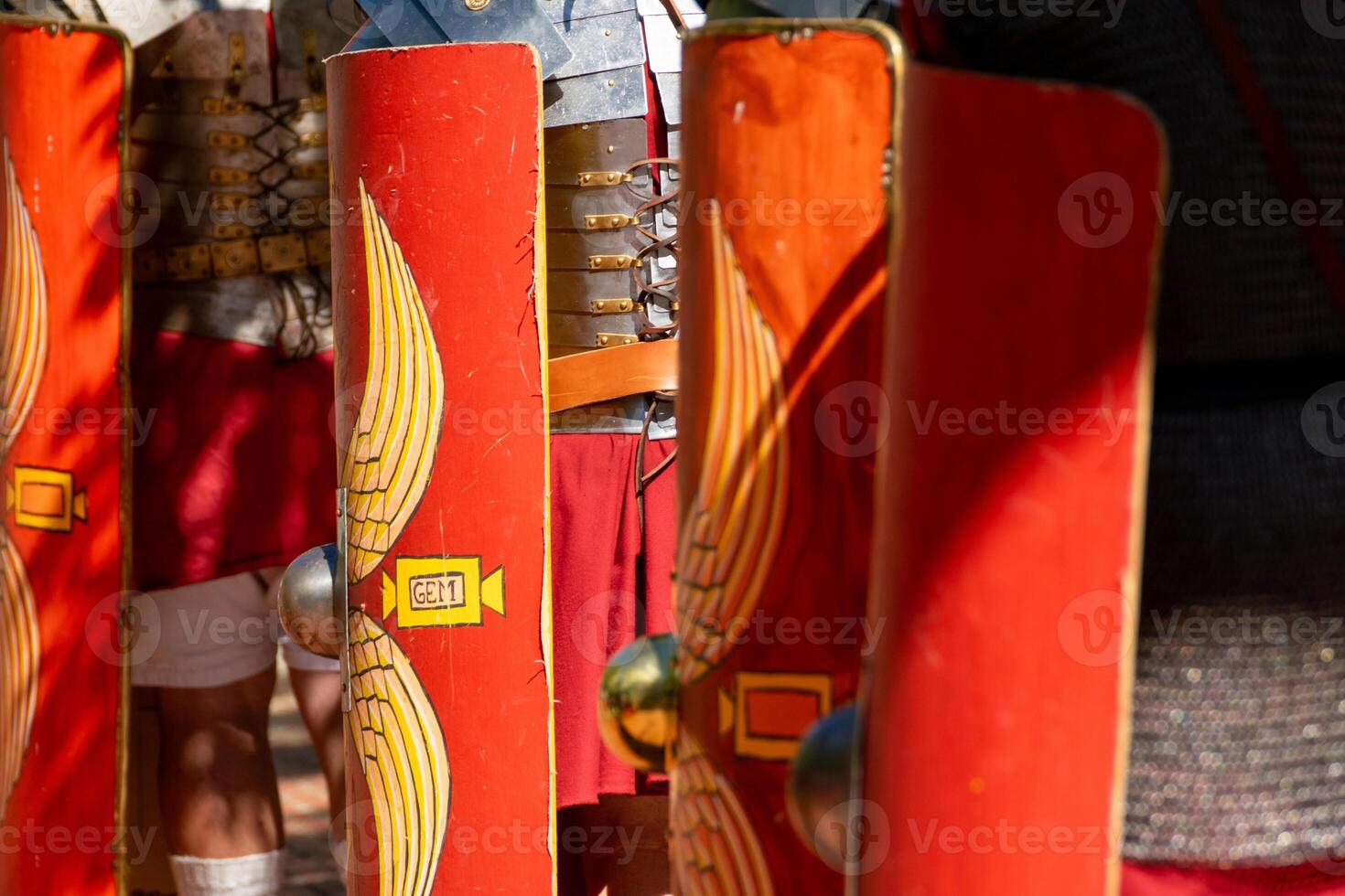 Roman legionaries parading in a historical reenactment party event about ancient Rome. photo