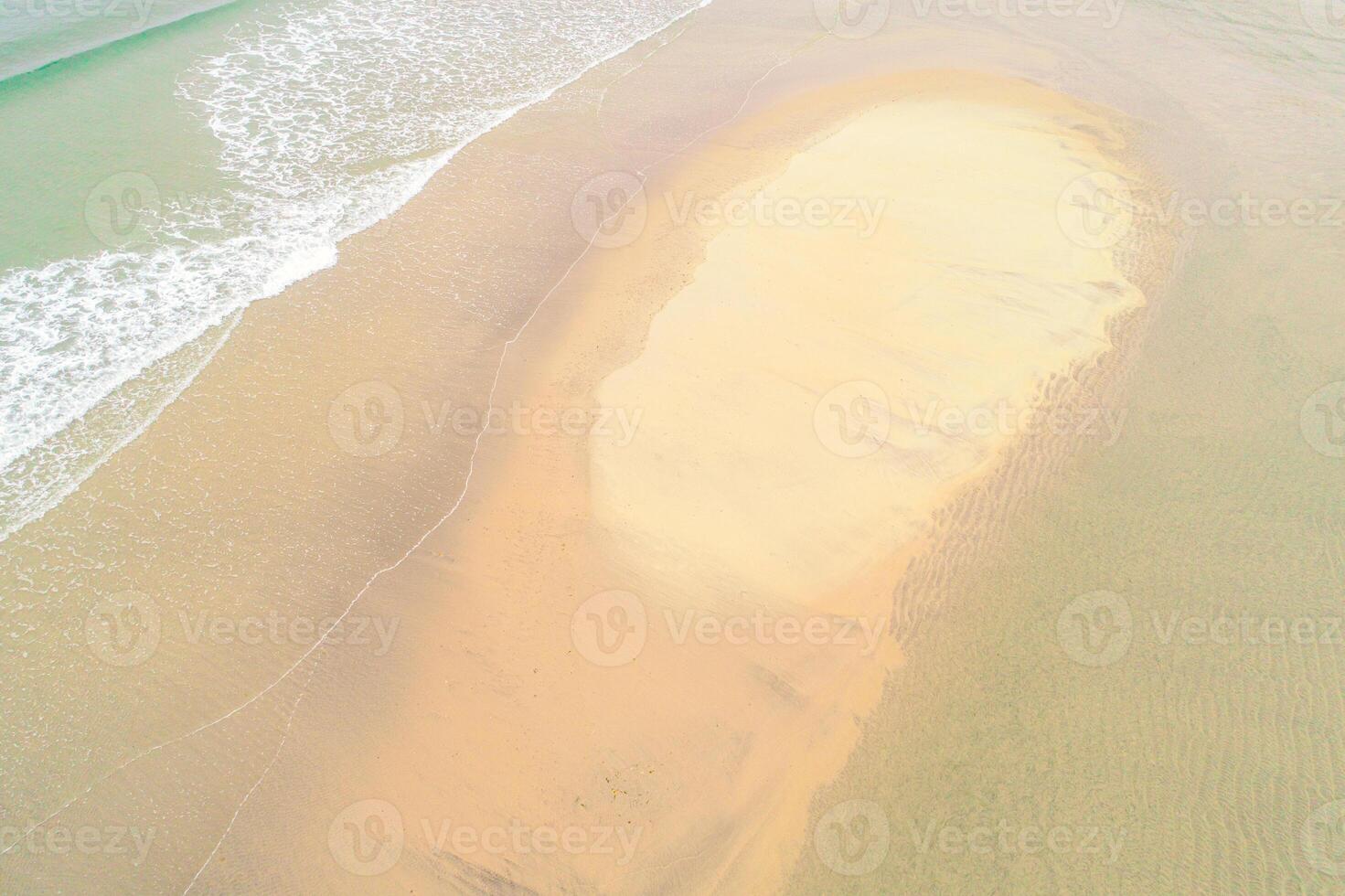 beach aerial view clear water shoreline coastal patterns, top down view aerial drone photo