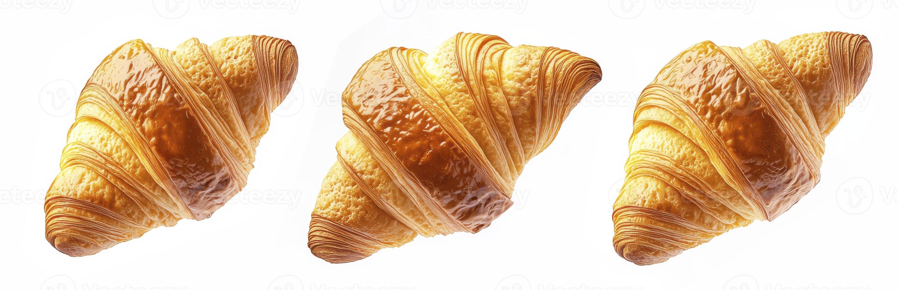 Three buttery croissants isolated on white background photo