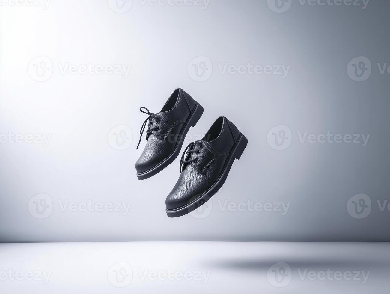 pair of black school shoes is floating in air, showcasing their sleek design and polished finish, evoking sense of style and elegance photo