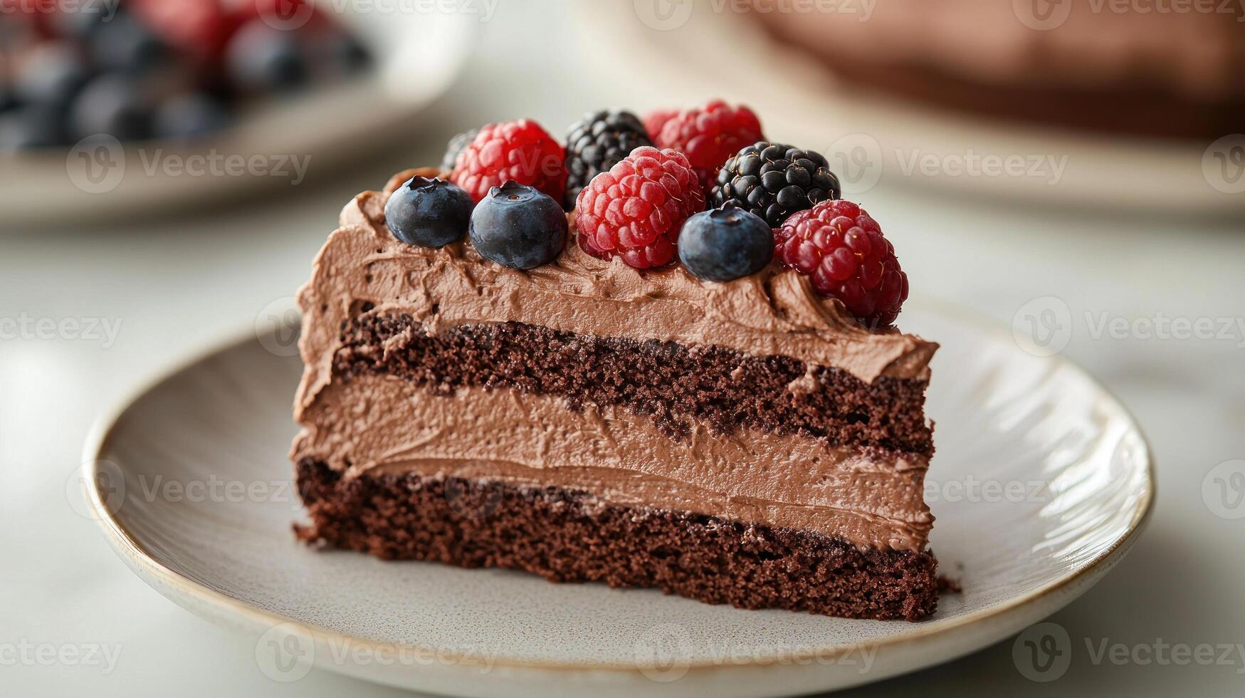 A slice of chocolate cake with berries on top photo