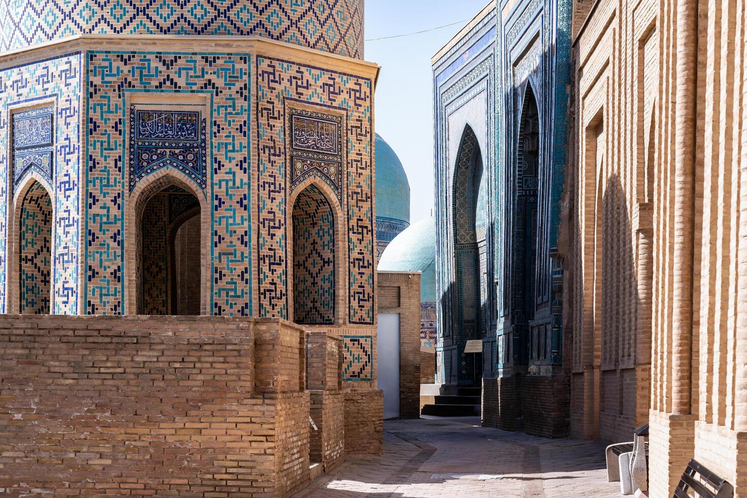 Samarkand, Uzbekistan-august 13, 2023-Particular of the Shakhi Zinda necropolis, a famous mausoleum complex in Samarkand during a sunny day. photo