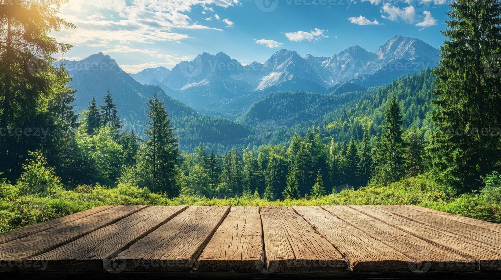 Wooden table with a scenic view of a mountain range under a clear blue sky photo