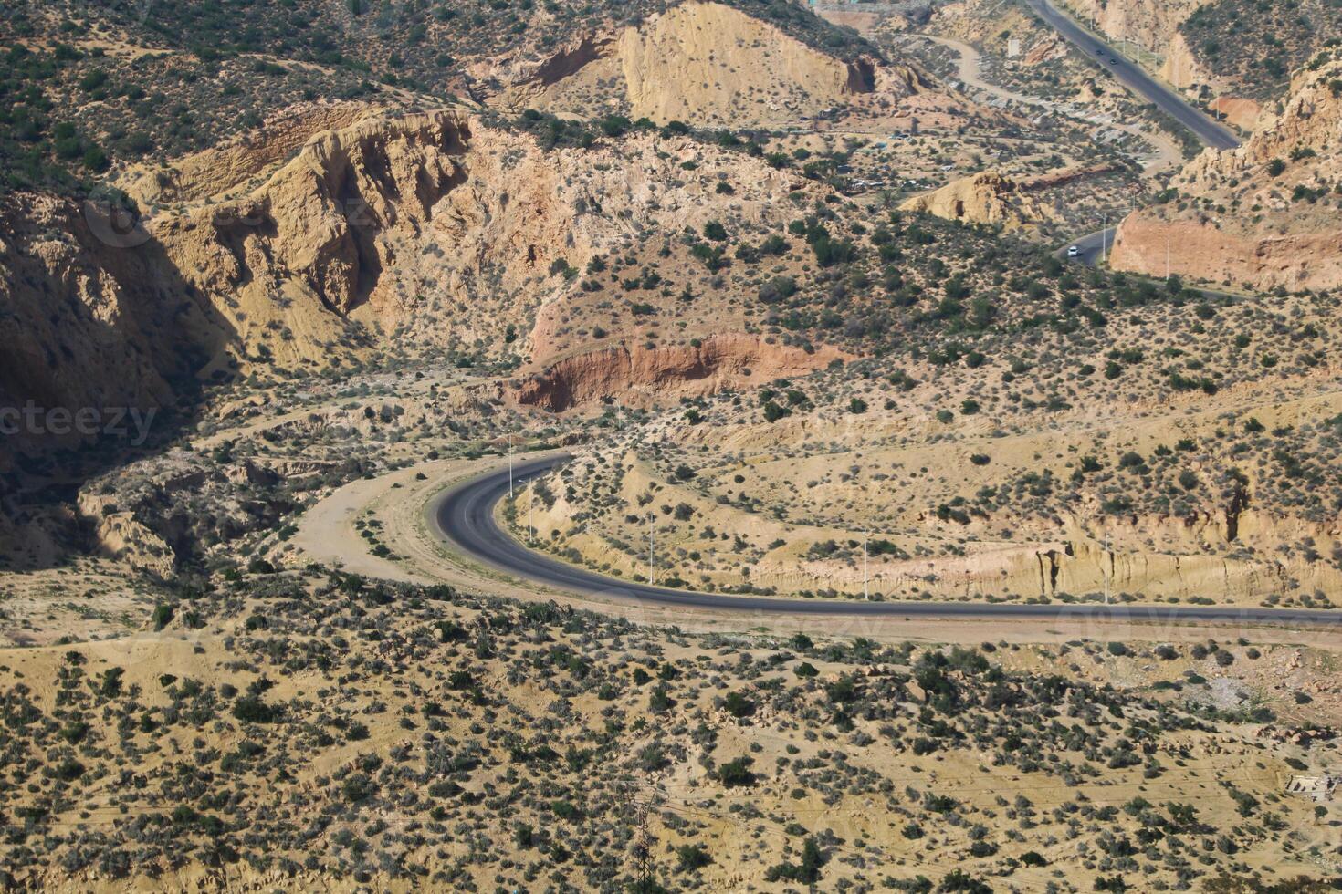 Curvy road on Agadir hills, natural landscape in southern Morocco photo