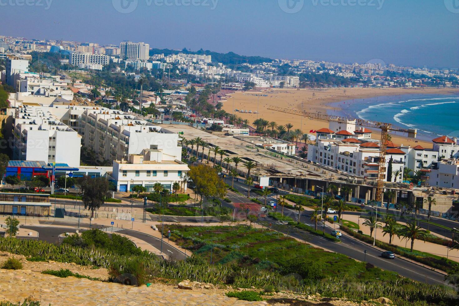 Agadir beach and cityscape, aerial view of agadir market and residential area photo