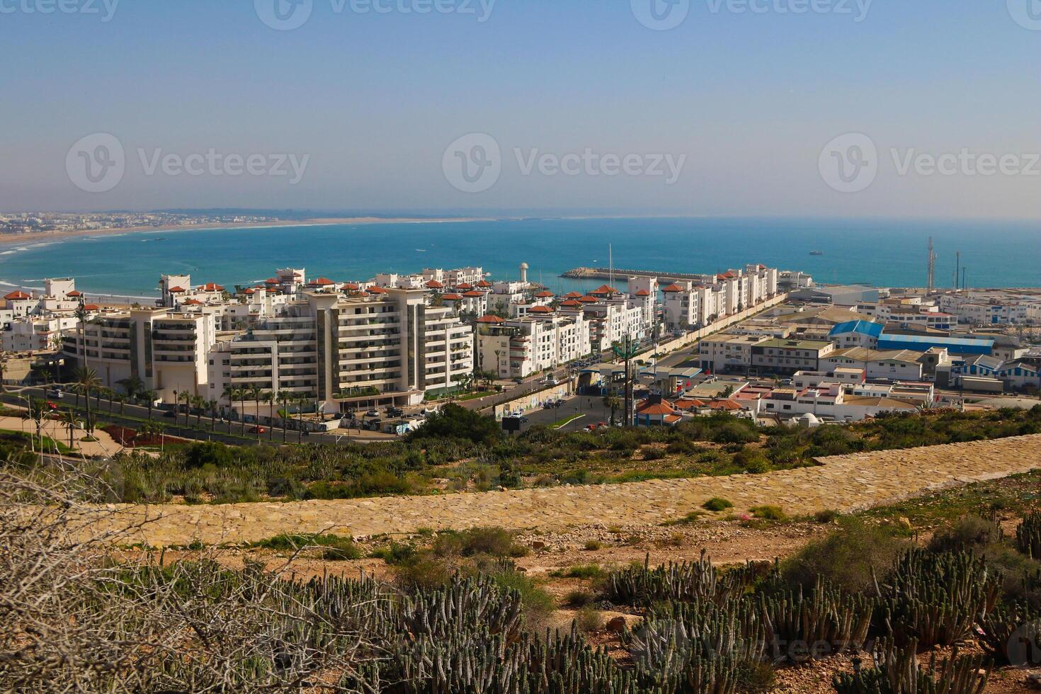 Seaside residential buildings near agadir port, view from agadir mountain photo