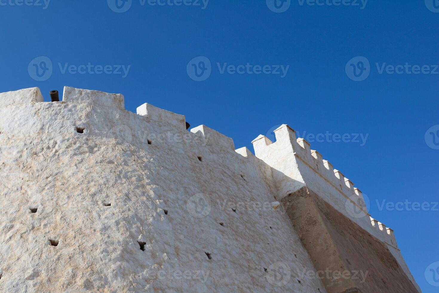 Corner angle of agadir oufella fortress wall under clear sky in agadir morocco photo