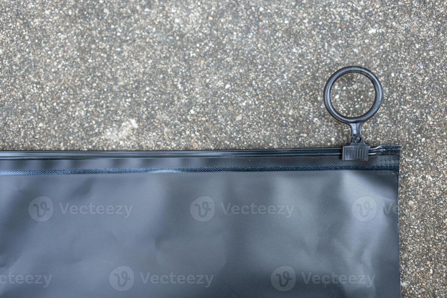 Close up of black zip bag photo