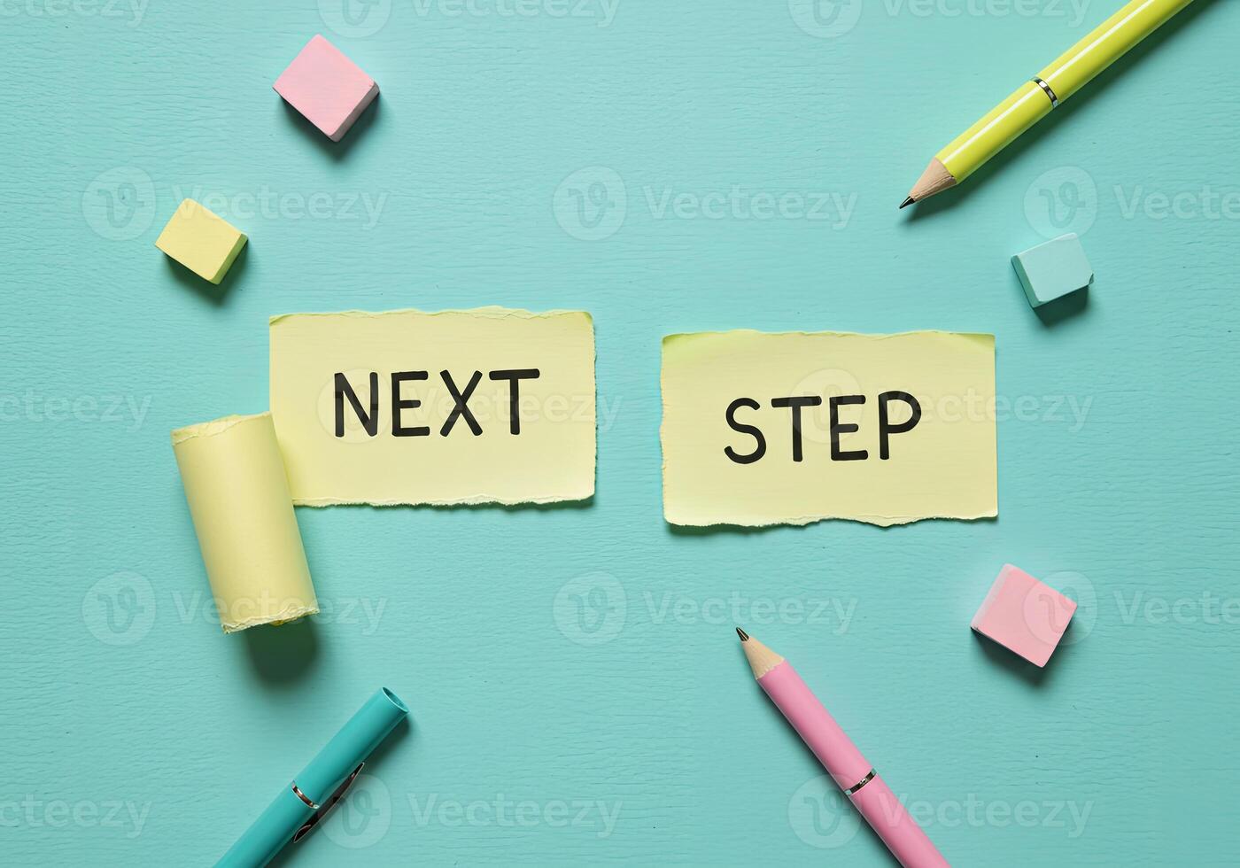 Next step and step concept with colored sticky notes and pencils on blue background photo