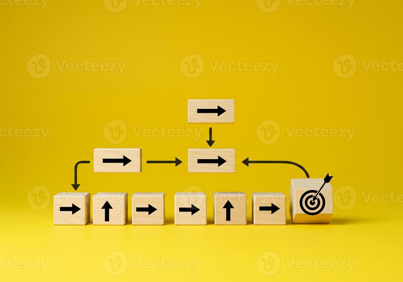 A wooden block with arrows pointing to a target photo
