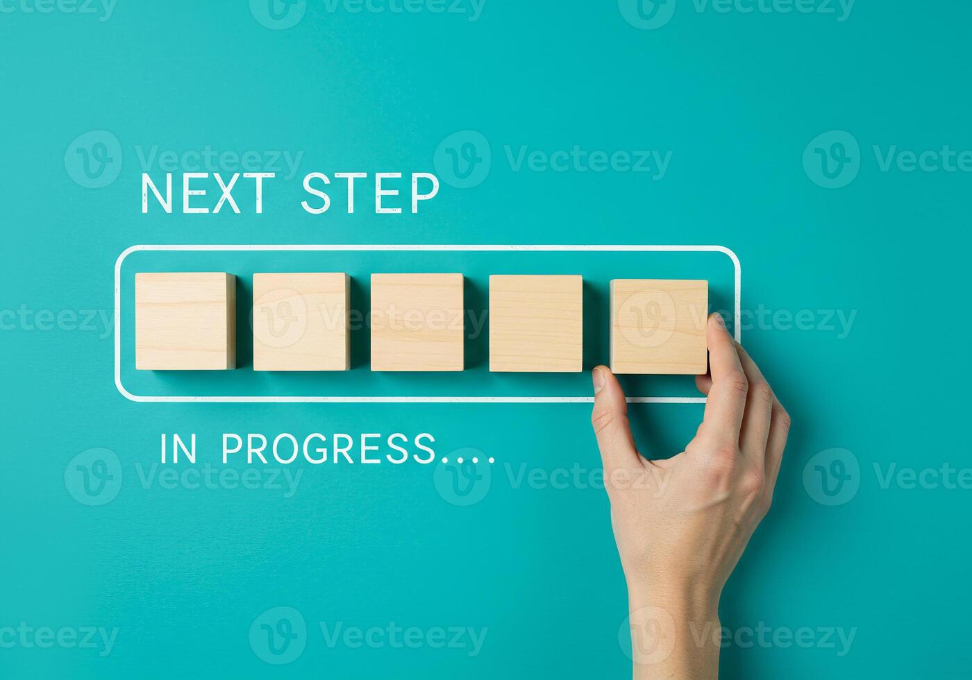 Hand pressing next step in progress on green background photo