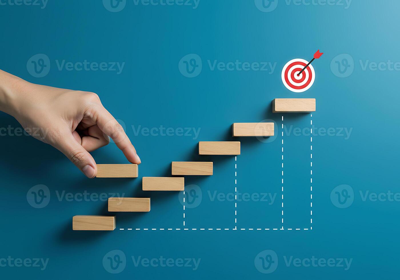 Hand pointing to a target on a wooden staircase photo