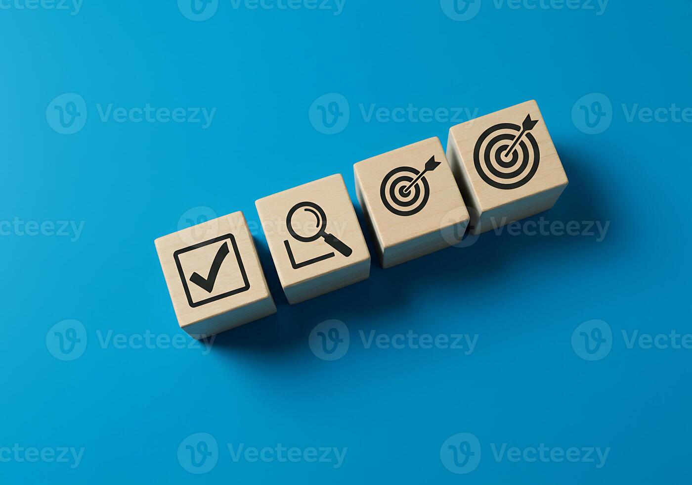 A wooden block with icons on it photo