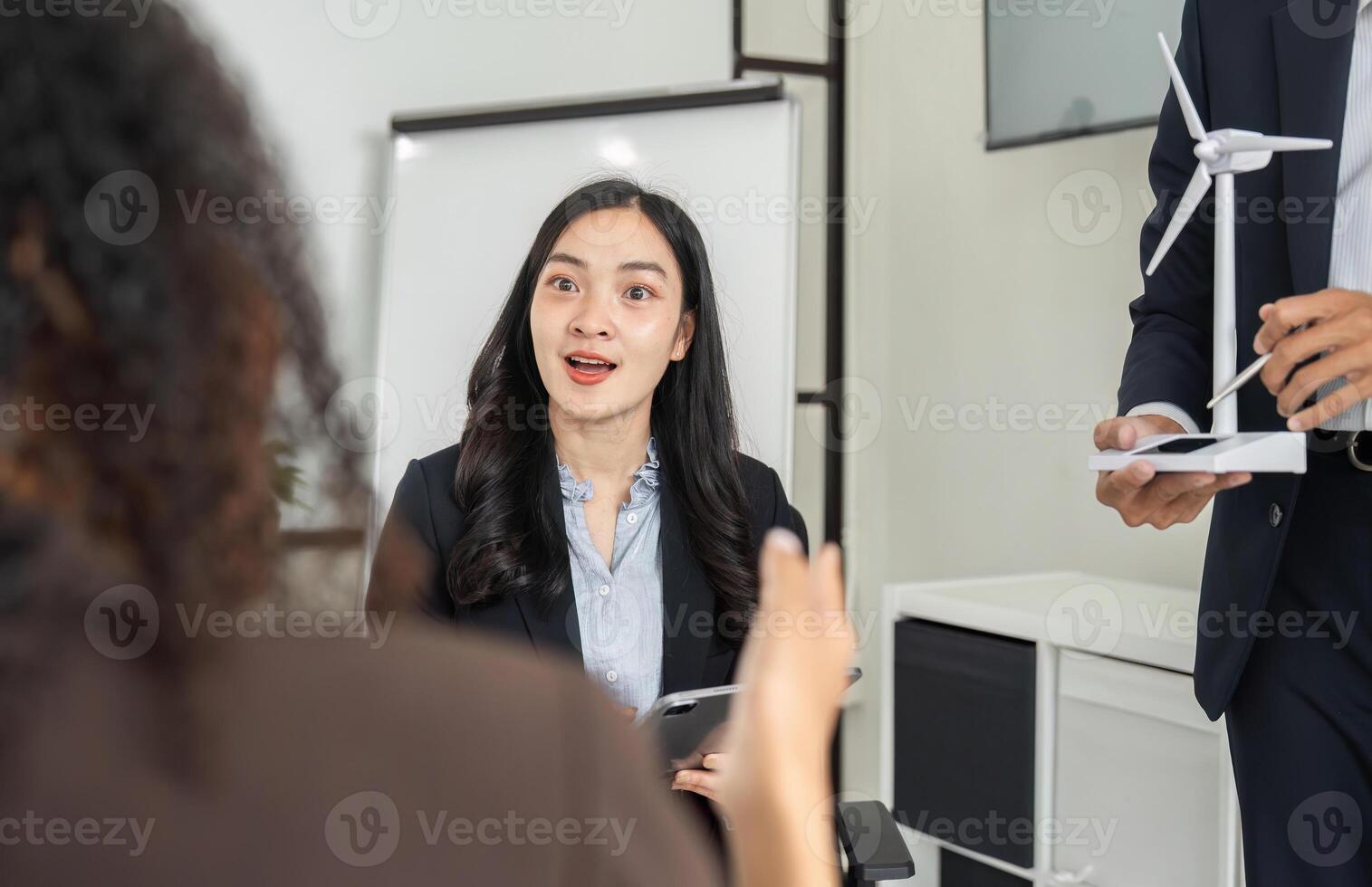 Engagement in ESG Strategies and Sustainable Development. A participant reacts during a crucial business meeting. photo