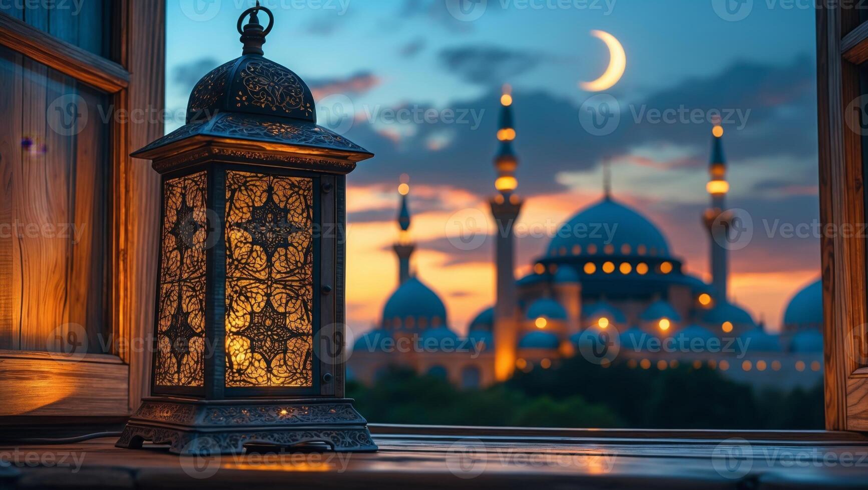 Islamic lantern on window sill at sunset photo