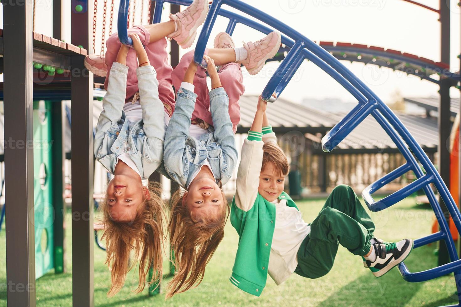 Cheerful ,,kids are having fun on the playground photo