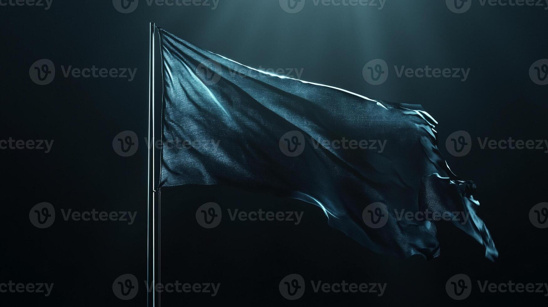 Black flag waving in the wind on a dark background photo