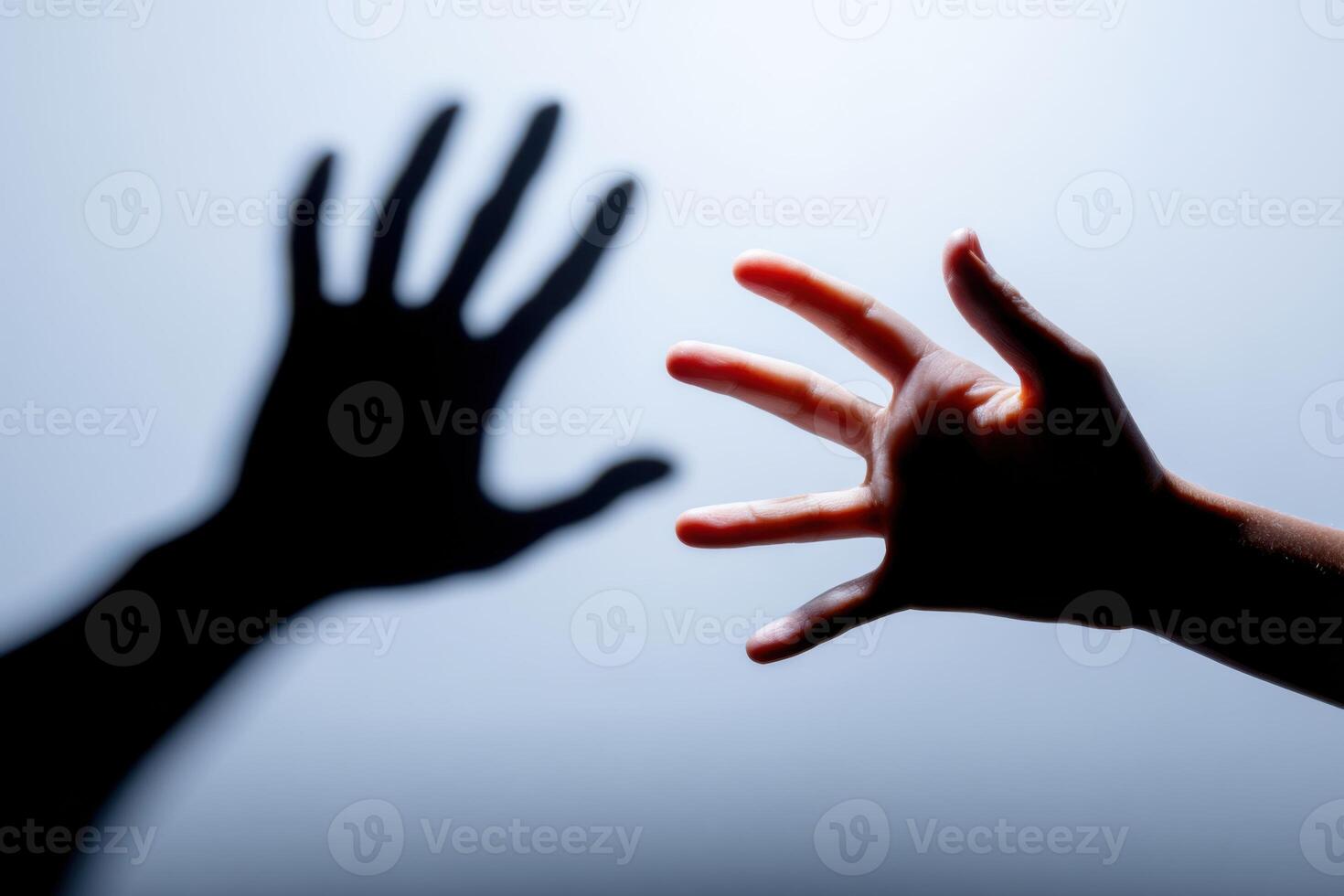 Emotional connection between two hands reaching out, symbolizing longing and desire for closeness, representing human relationships and bonds, emotional connection concept photo