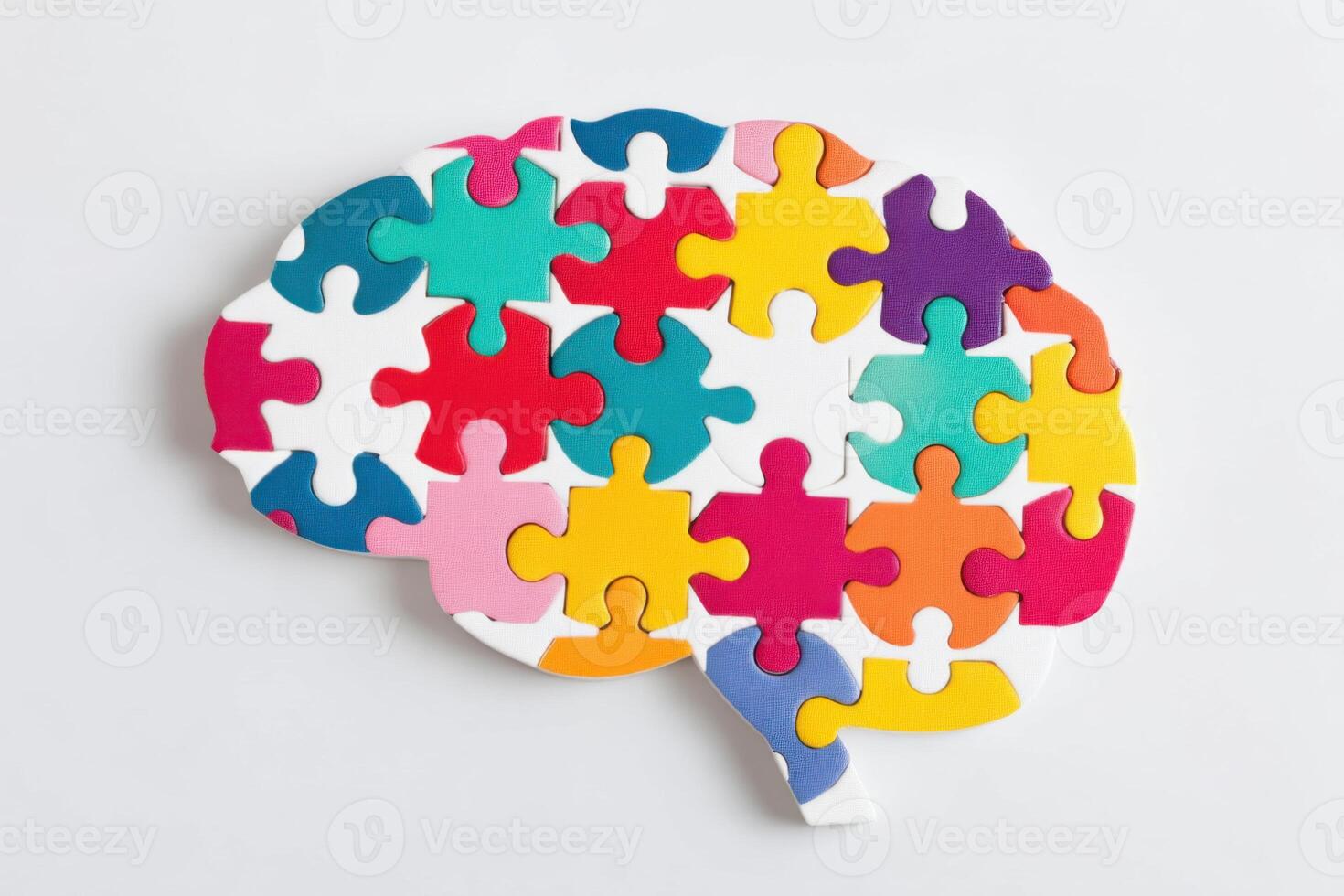 Colorful puzzle forming a brain shape promoting mental health awareness photo
