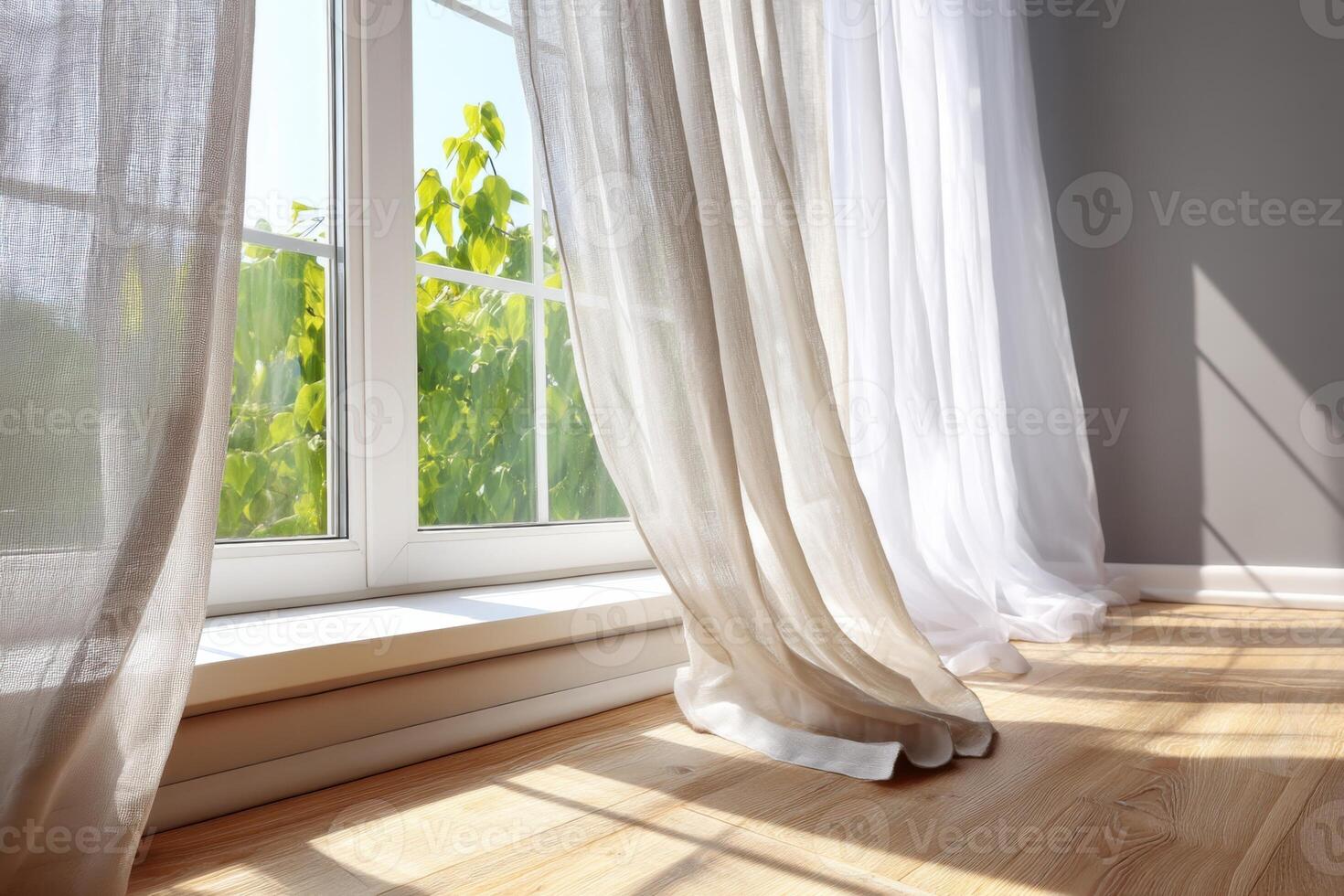 Light beige sheer curtains gently blowing in the breeze by open window photo