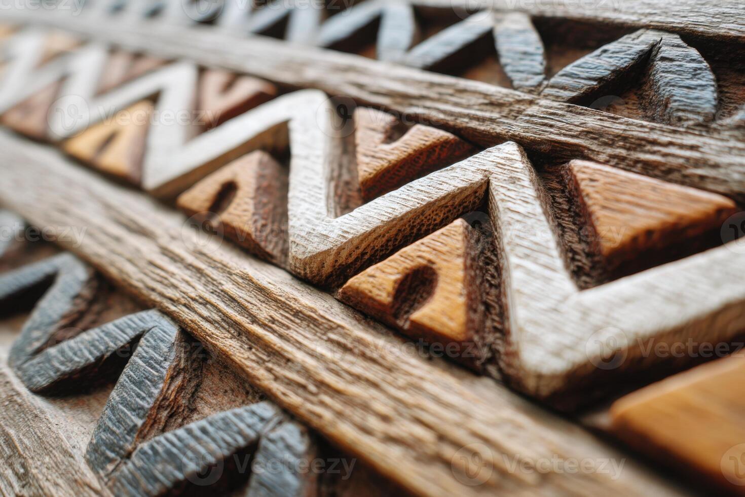 Close-up of intricate Polynesian hand-carved wooden panel showcasing traditional patterns photo