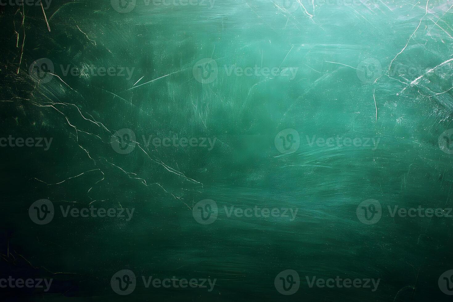 Green chalkboard with textured surface showing subtle scratches and marks reflecting years of classroom use, education background photo