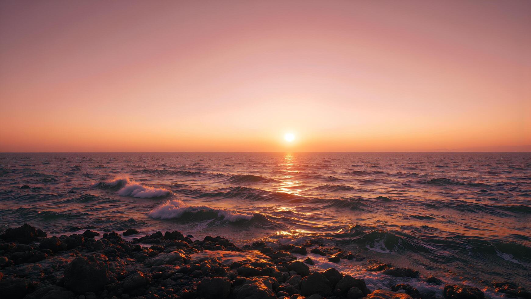 Serene Sunset over Ocean Waves and Rocky Shoreline at Dusk photo