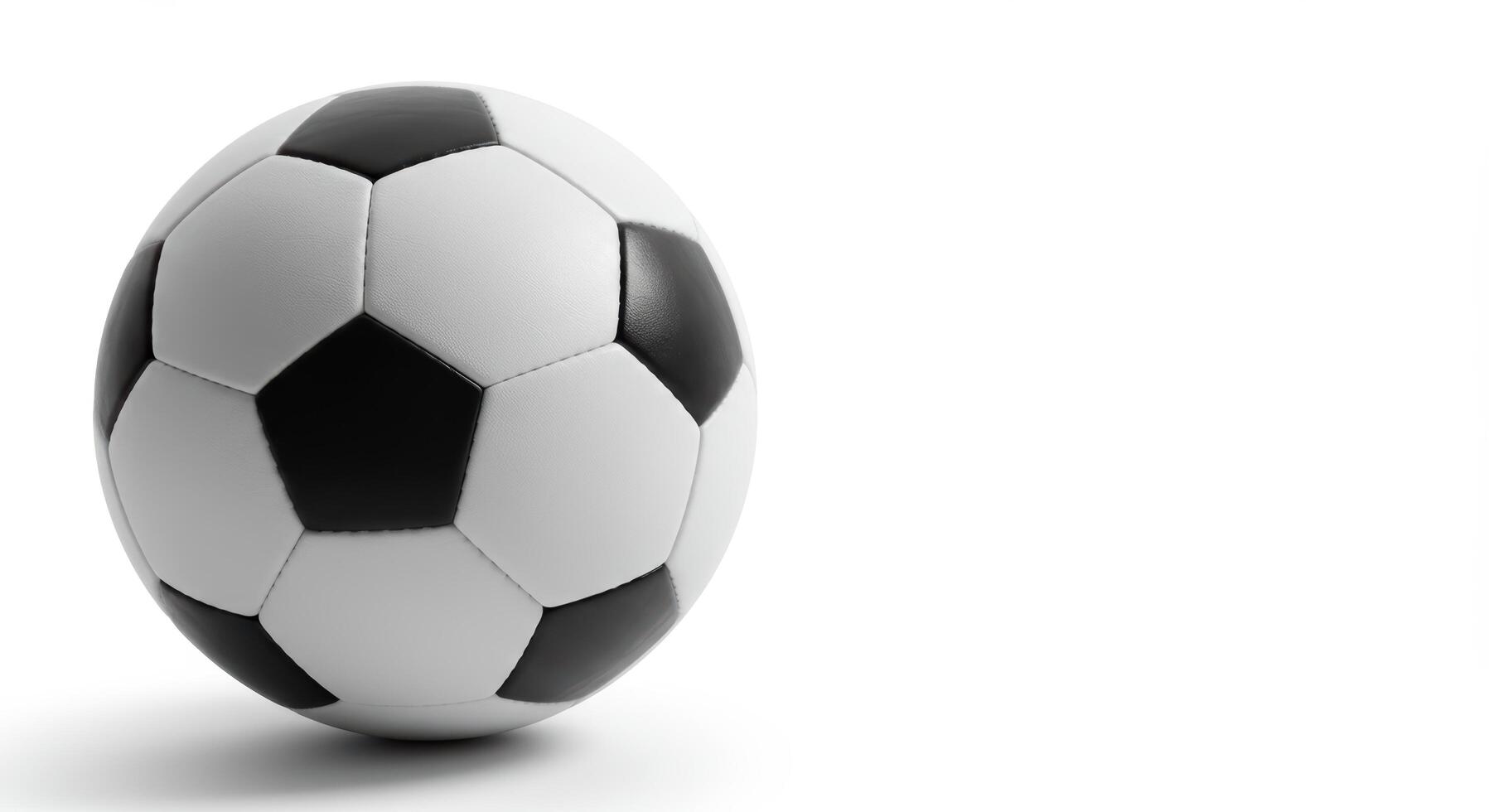 Black and white soccer ball, perfect for sports websites, social media graphics, sports event promotions, and athleticthemed designs. photo
