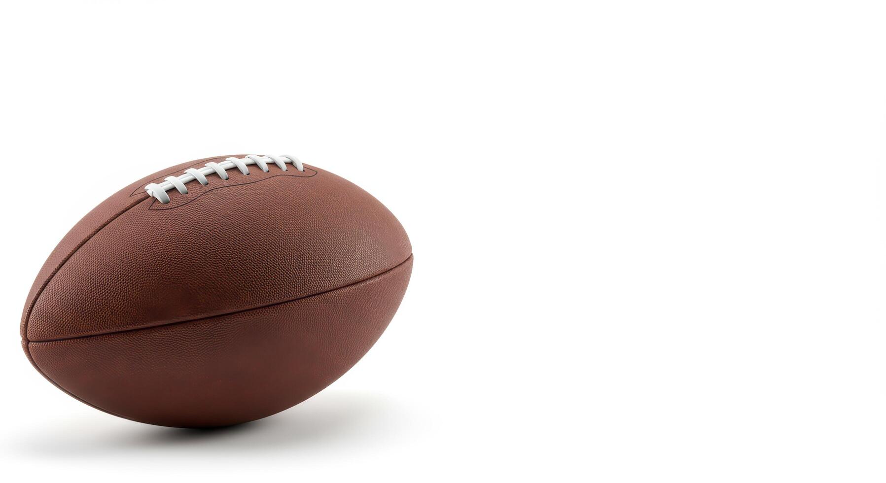Brown leather football on a white background suitable for sports websites, blog posts, social media graphics, and product design. photo
