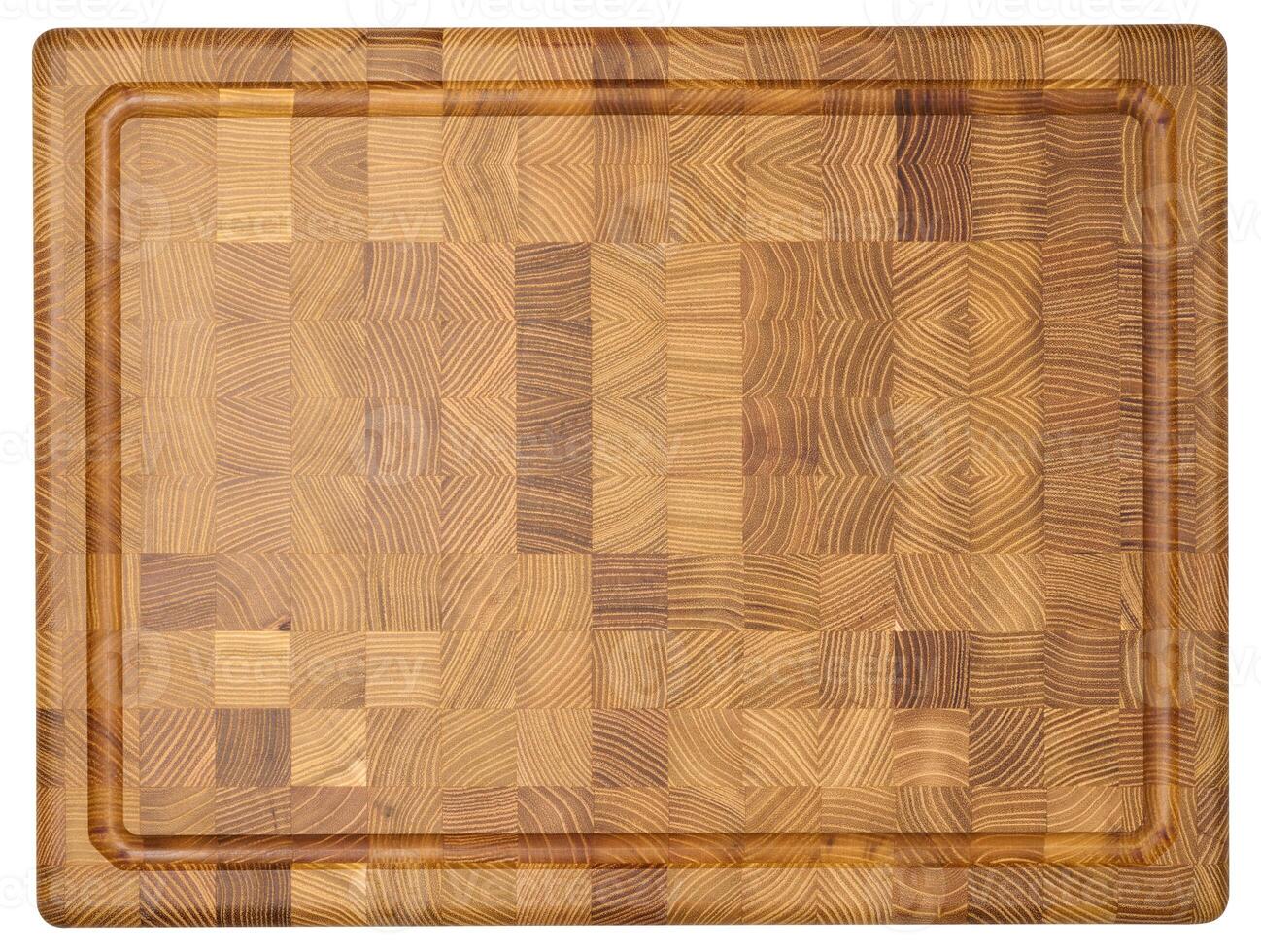 Top down view of a rectangular wooden cutting board made of end grain construction, showcasing a mosaic of wood patterns photo