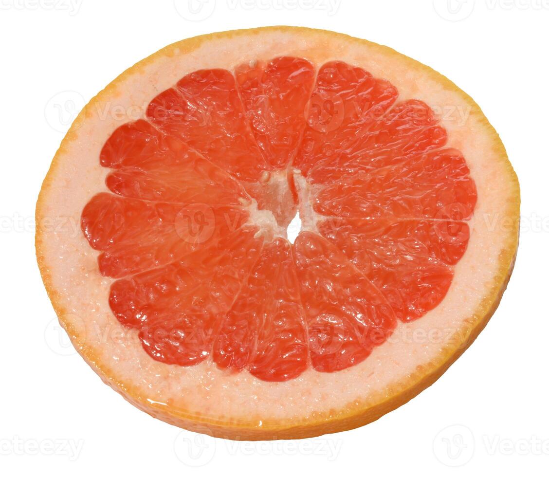A slice of ripe grapefruit on an isolated background photo