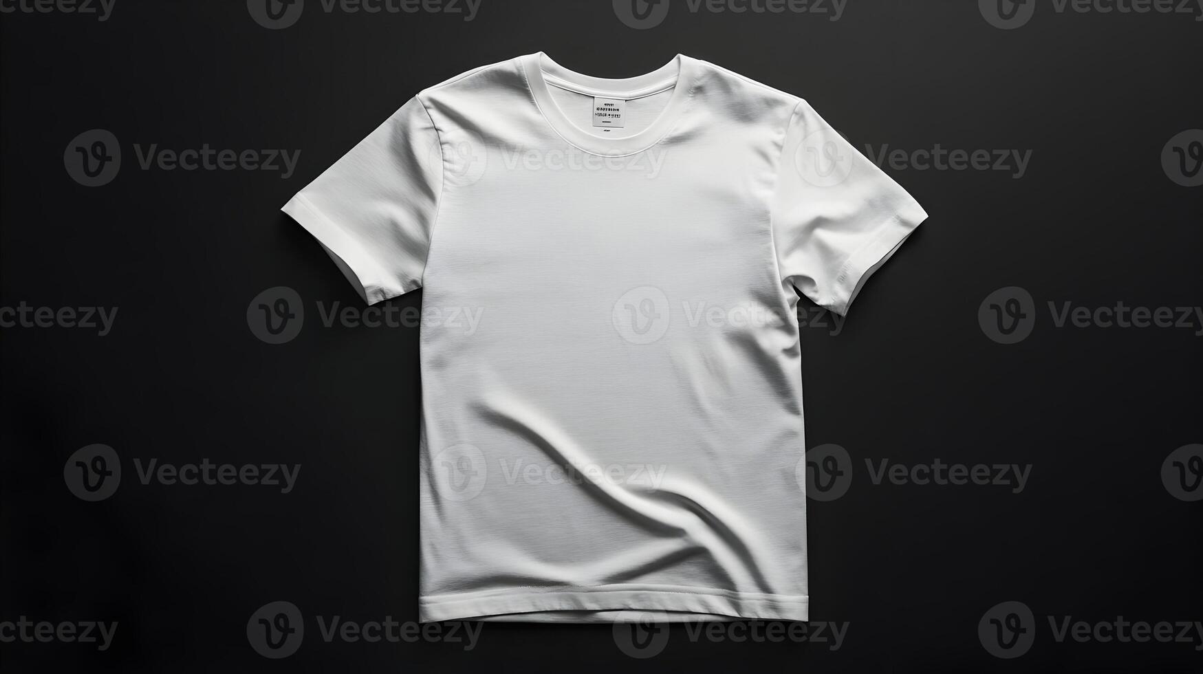 Simple white t-shirt displayed on a dark background, emphasizing minimalism and classic casual wear. photo