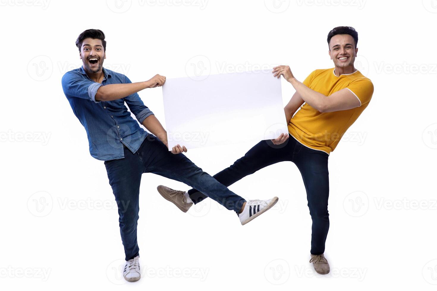 Smiling male models are holding a Whiteboard. photo