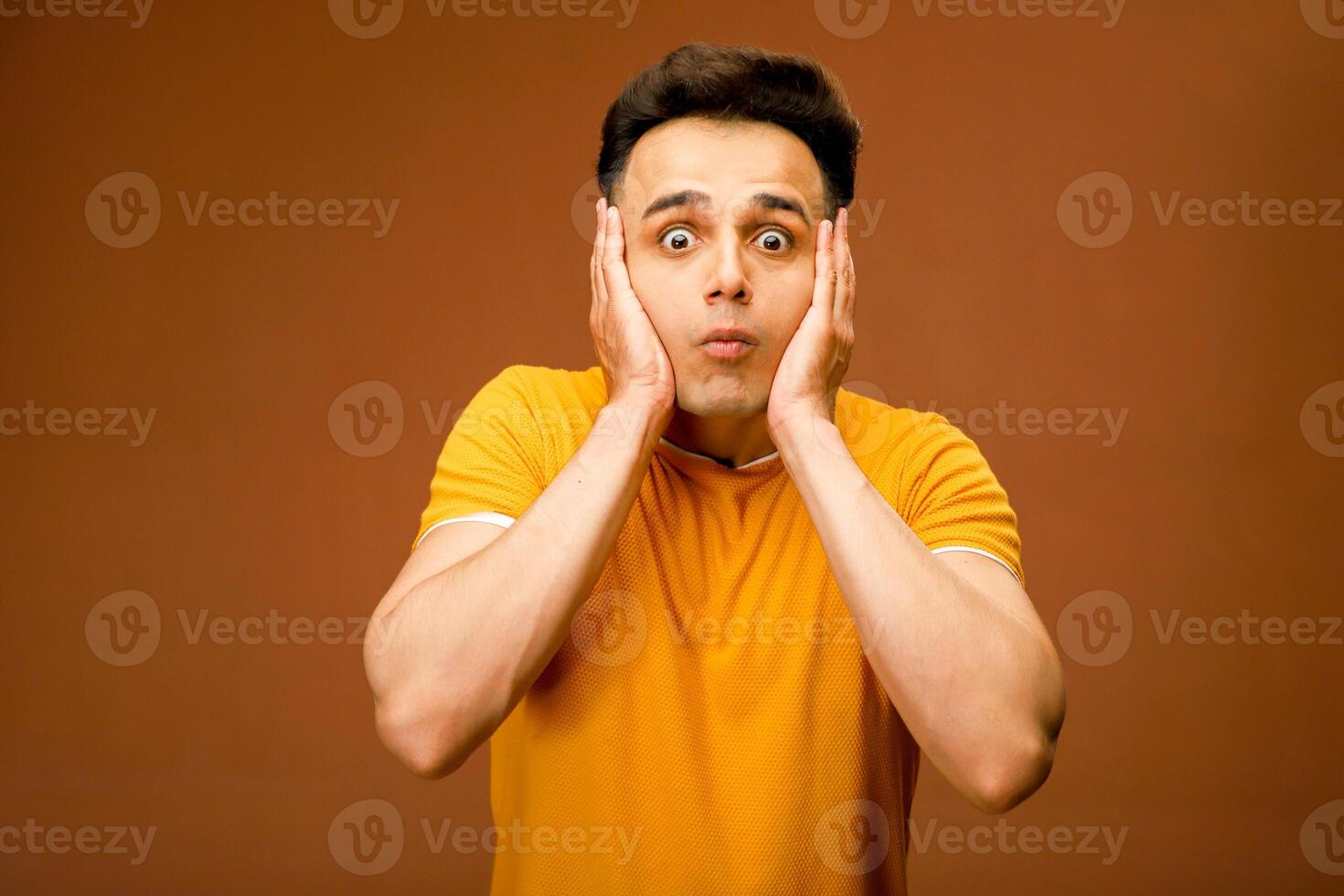 Male model with a surprised expression on his face. photo