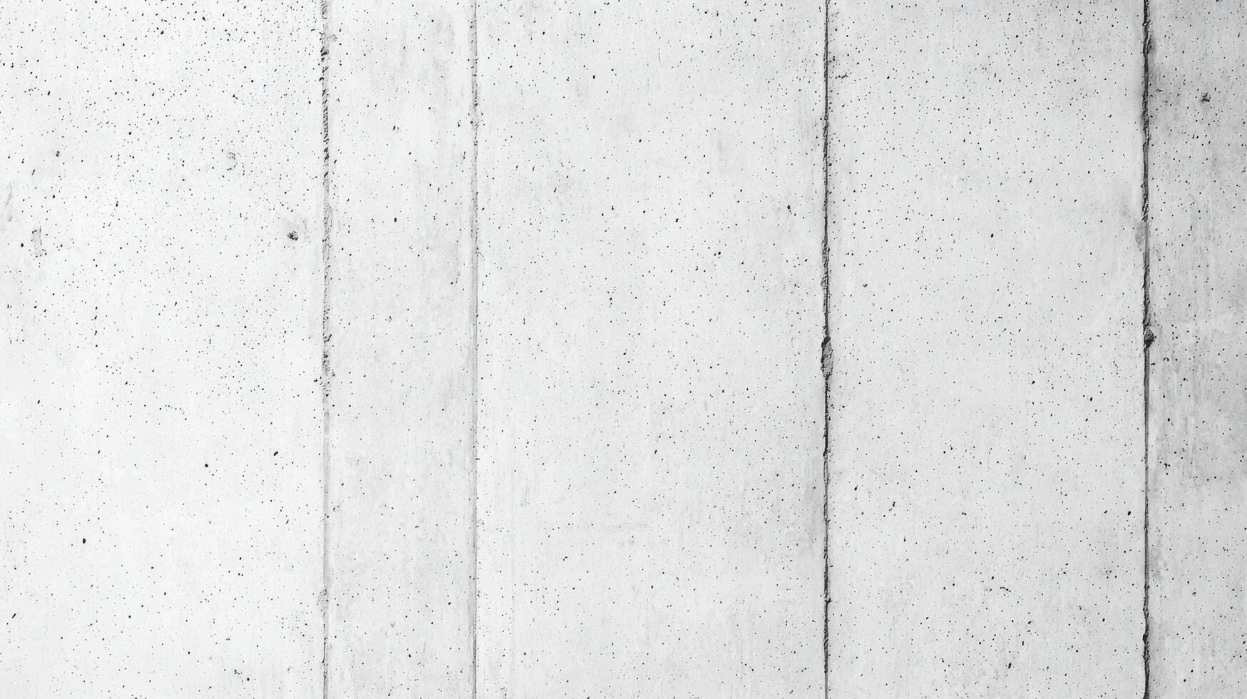Light Gray Concrete Wall Texture with visible vertical seams and small pores ideal for backgrounds or architectural design elements. photo