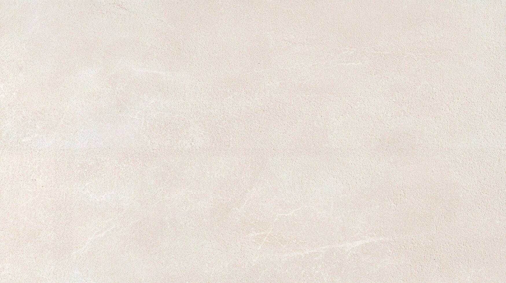 Light Beige Textured Concrete Wall Surface with subtle grain and roughness ideal for backgrounds, architectural elements, or design projects requiring a neutral stone texture. photo