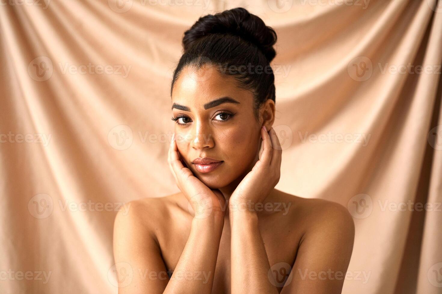A woman with no shirt on posing for a photo