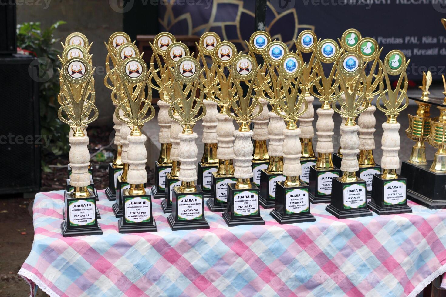 Trophy display for student competition winners arranged for education award ceremony and academic achievement recognition photo