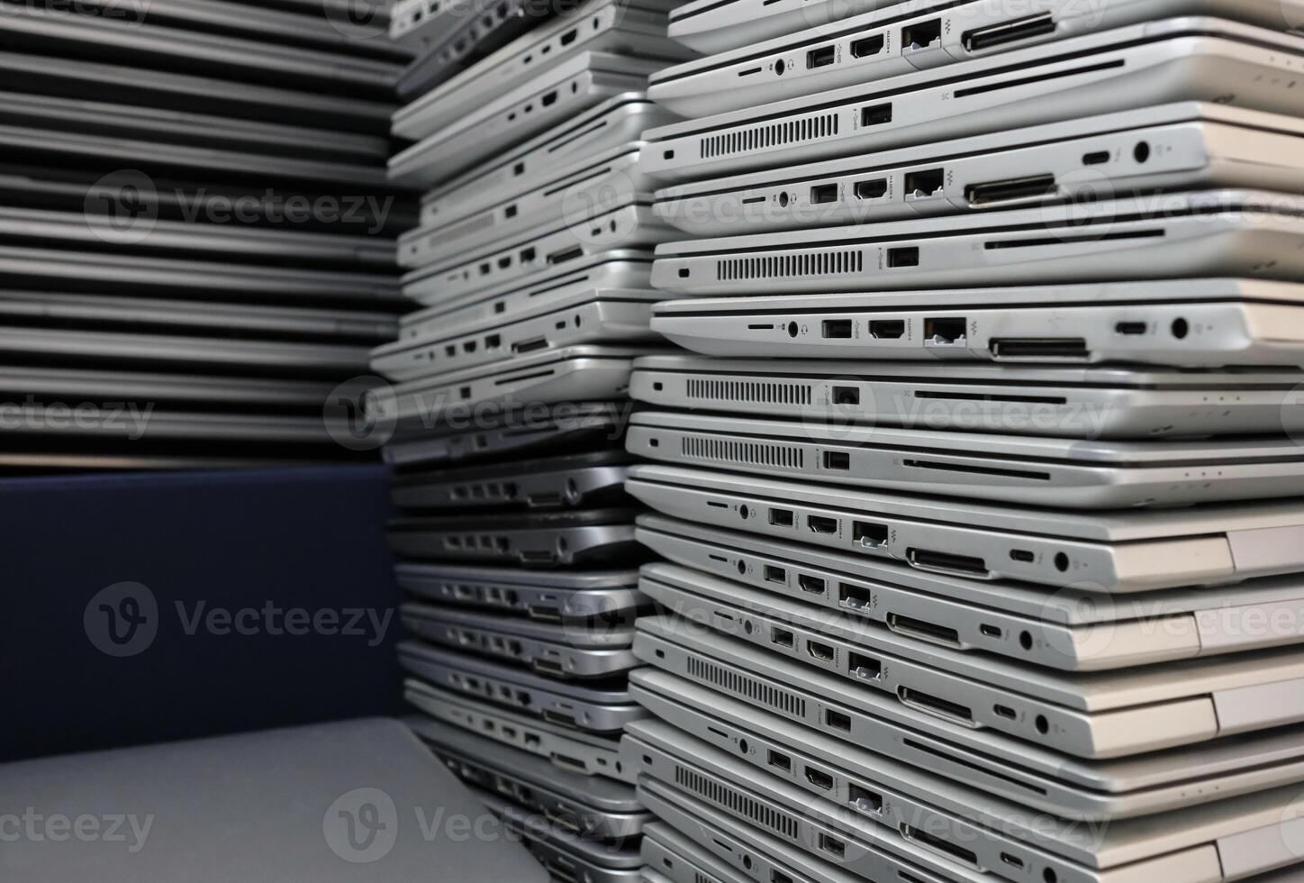 E-waste - dozens of laptops in a storage room photo