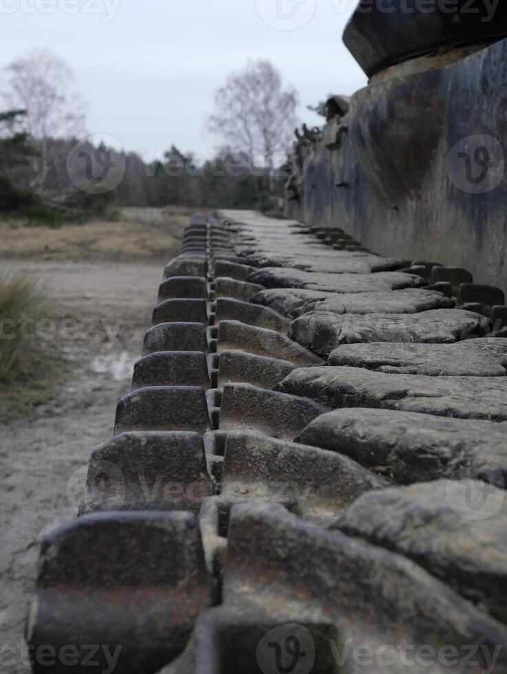 Remains of a tank from the second World War in a forest in Western Germany photo