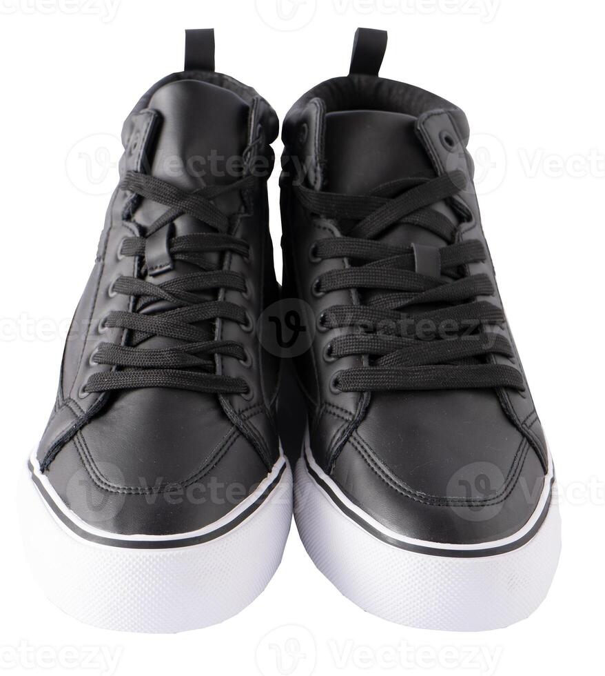 Shoes isolated white background. A pair of black leather shoes. New fashionable sneakers. Sports style. Unisex boots. photo