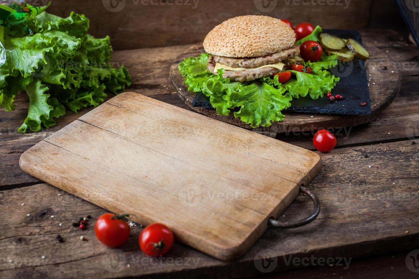 Wooden empty cutting board on the table. photo