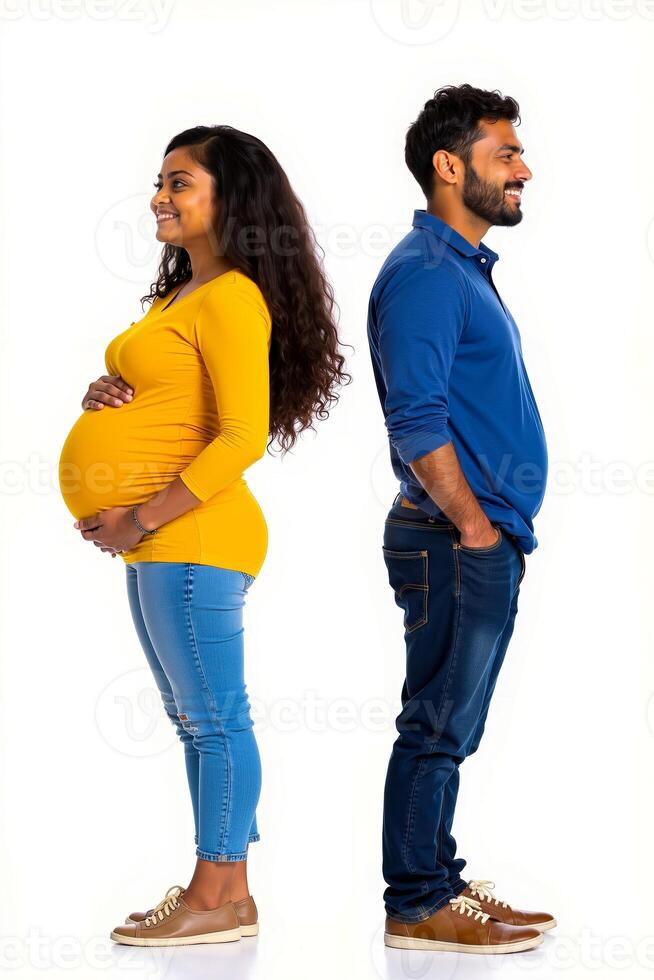 A man and a woman standing next to each other with their hands on their belly photo