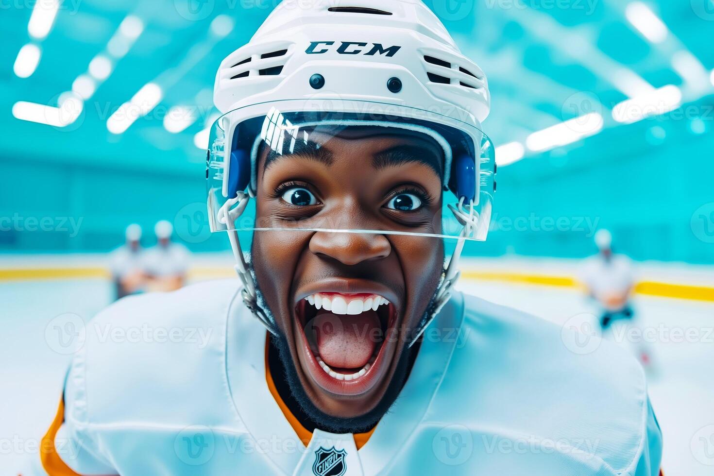 A hockey player with his mouth open and tongue out photo