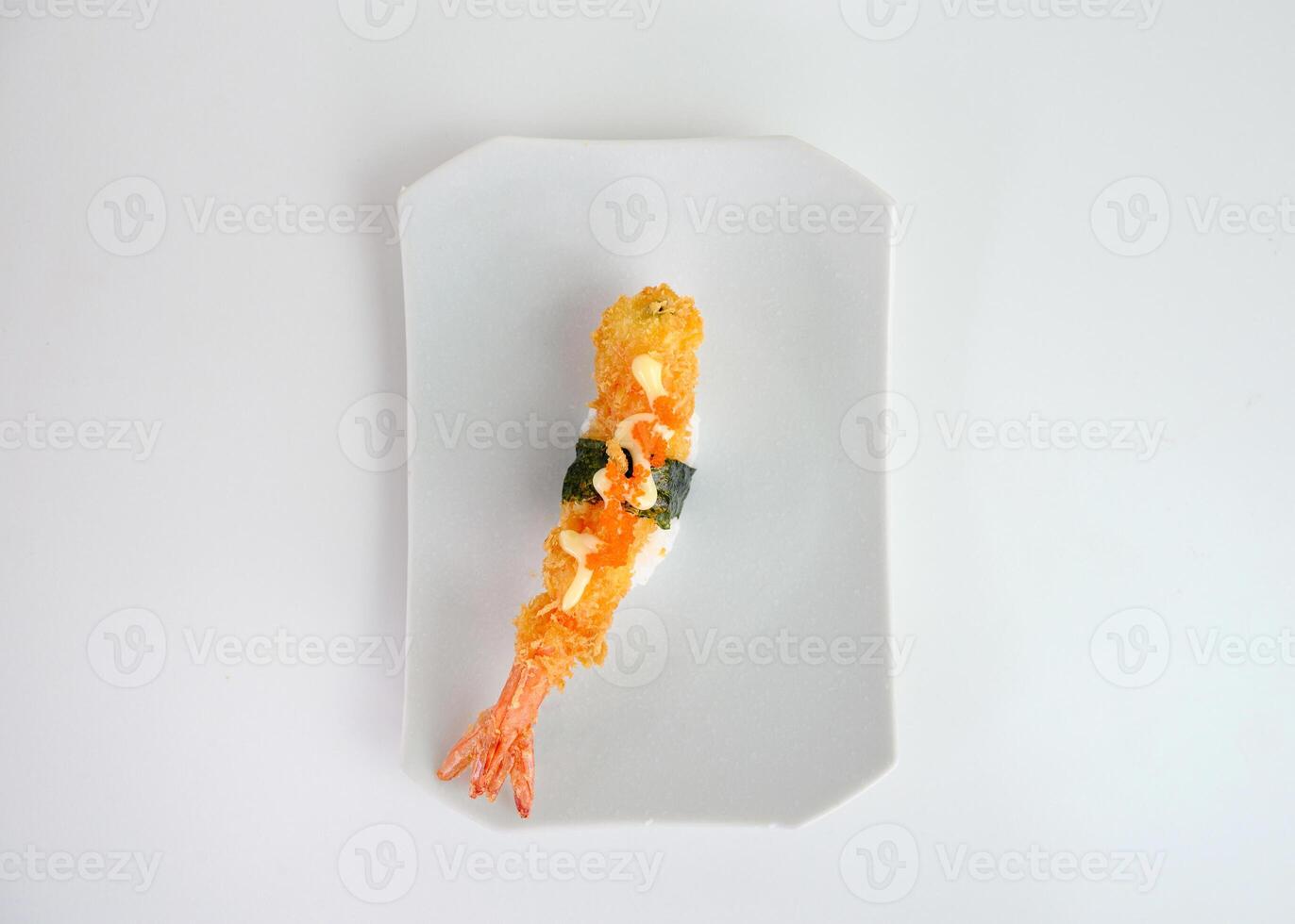 Deep fried shrimp tempura sushi nigiri with breadcrumbs and seaweeds photo